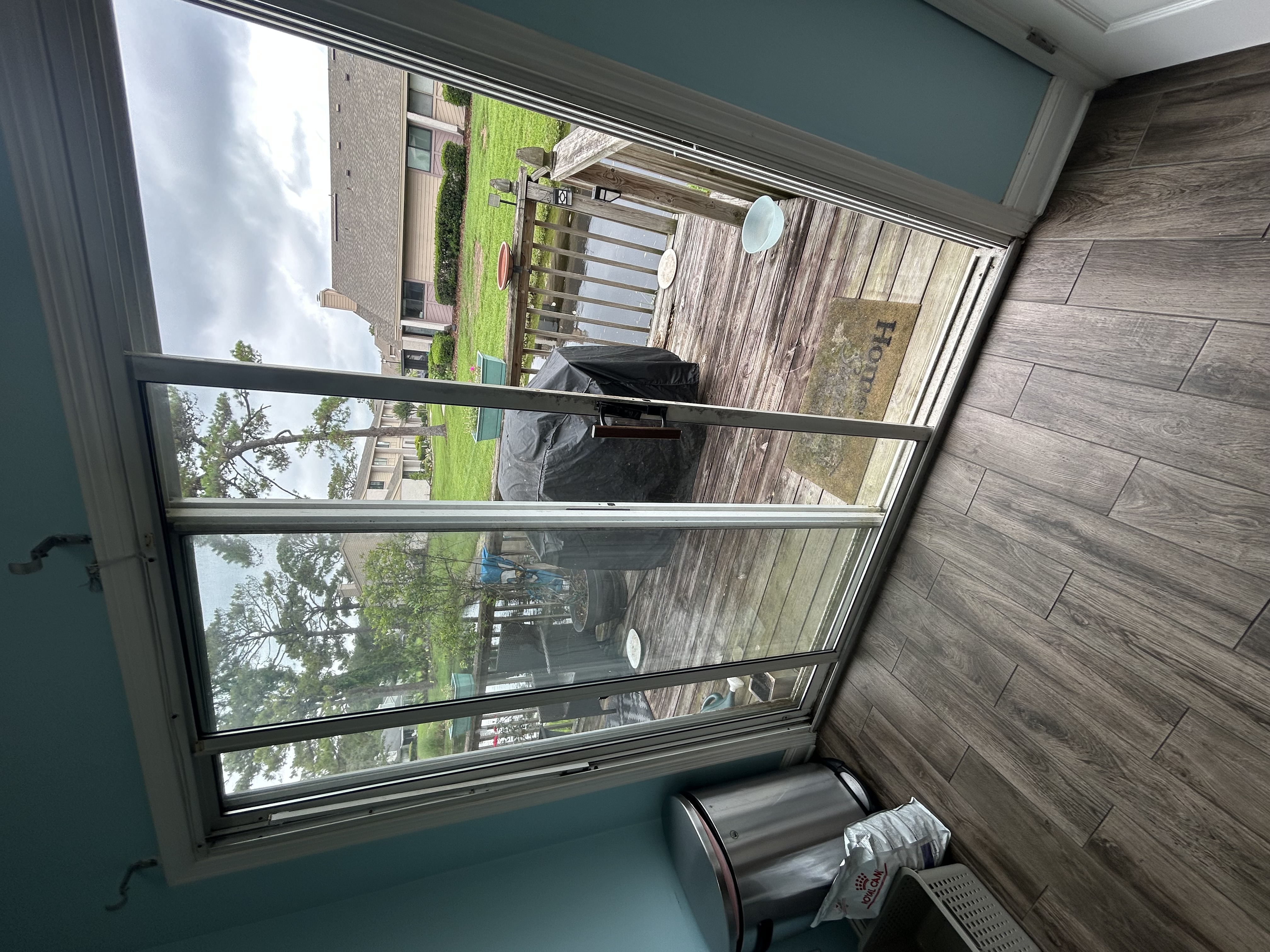 Old worn sliding patio door showing signs of wear