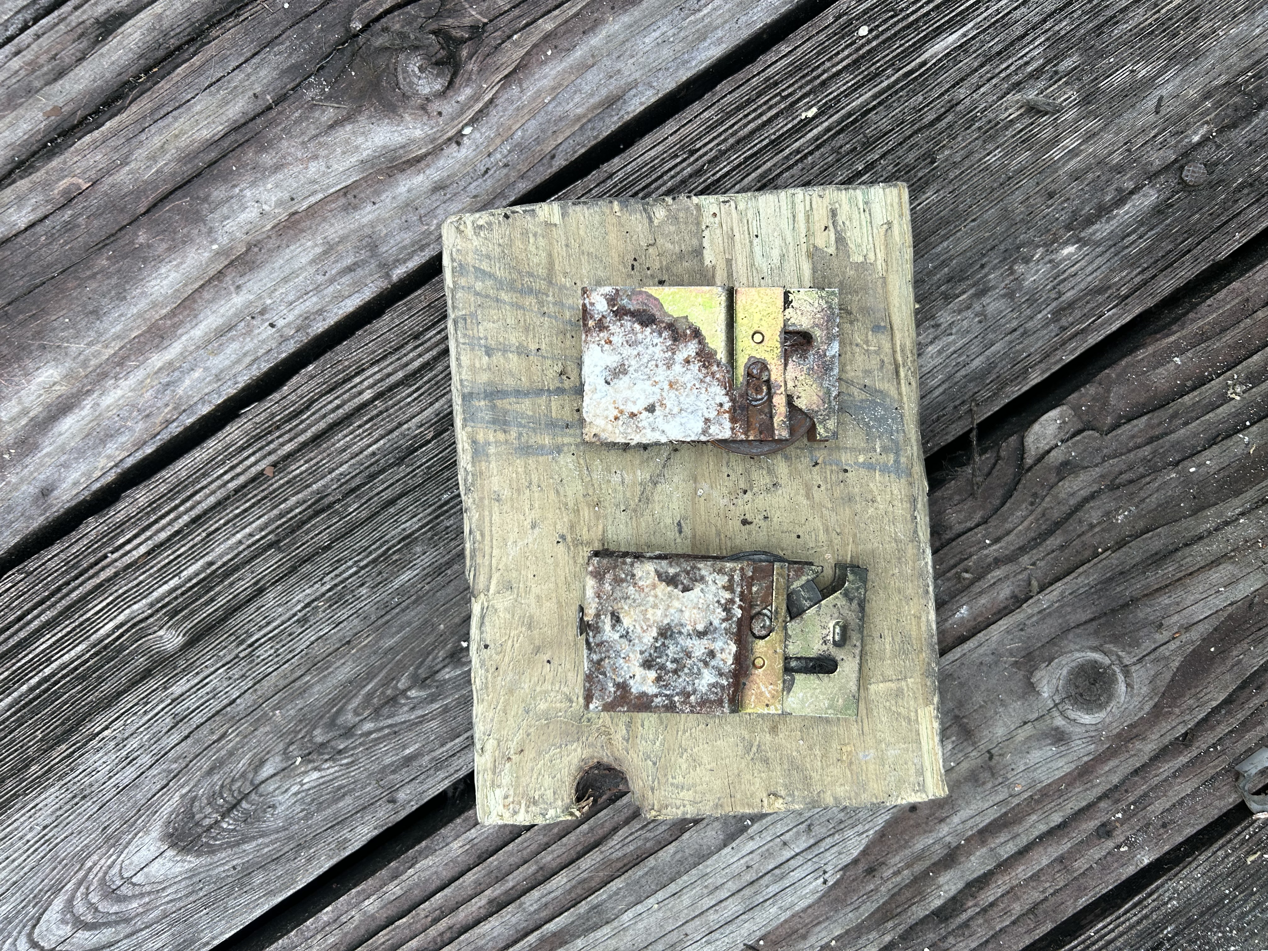 Rusted old sliding door rollers